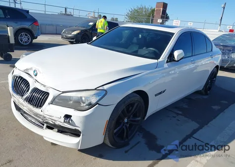 2015 BMW 740I из США, поврежденный, VIN WBAYA6C59FGK16663